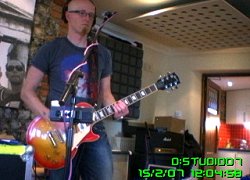 Stu playing guitar