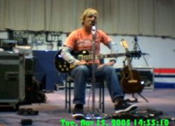 Martin singing and playing