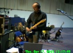 Stu playing guitar