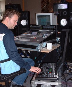 Julian Kindred at work in the studio during the recording of World Service