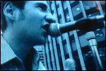 Video still: Martin singing close-up