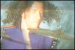 Video still: Stew behind the drum kit
