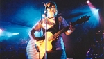 Martin with acoustic guitar